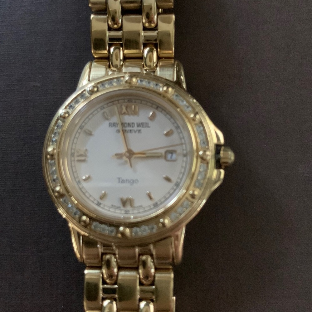 Raymond Weil Tango Diamond Gold  Watch
It is a show stopper!!